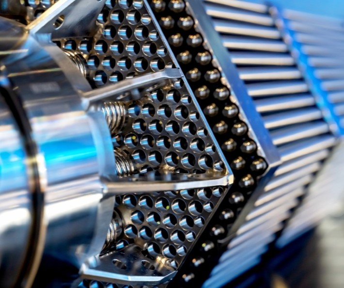 Close-up of nuclear engineering equipment representing infrastructure and technology in the EMINE programme
