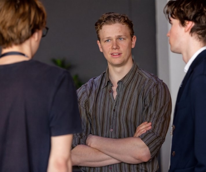 Students speaking together at a networking event