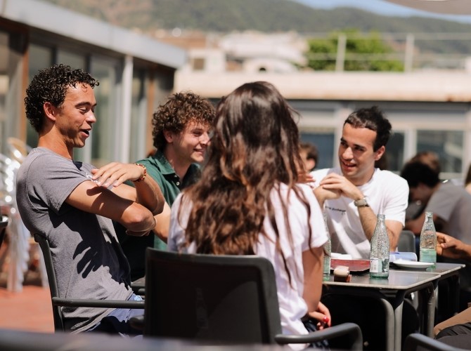 Students socialising together at an outdoor event