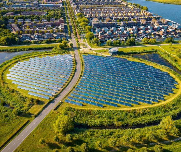 Aerial view of a solar power installation integrated into the surrounding electricity system